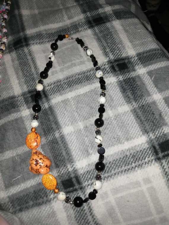 Orange and hotsell black jewelry