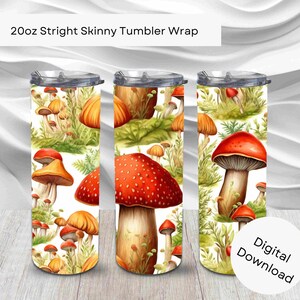 May include: A digital download for a 20oz straight skinny tumbler wrap featuring a pattern of red and orange mushrooms on a white background with green foliage.