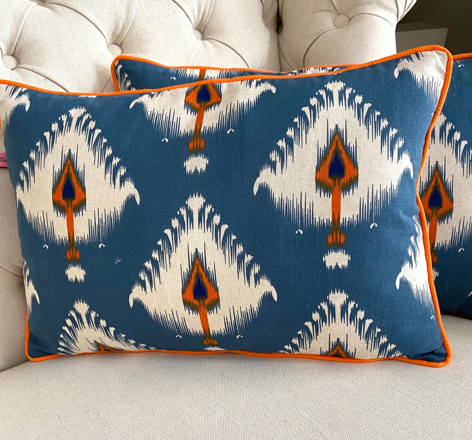 Rectangular cushions in a blue calico white with a splash of Etsy