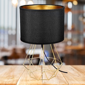 Modern loft-style table lamp with elegant black and gold shade (black)
