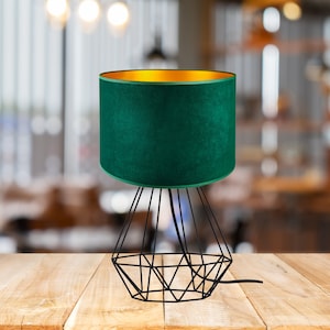 Modern loft-style table lamp with elegant green and gold shade