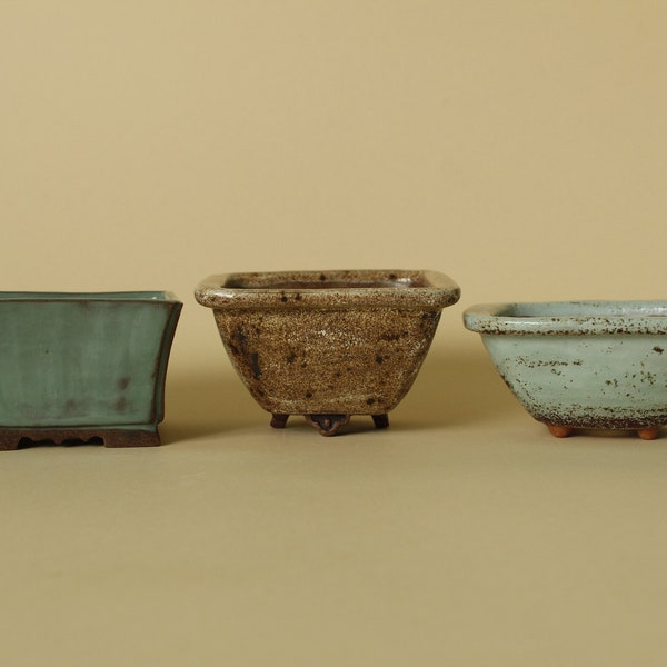 Bonsai pots, green - 8.5 x 8.5 x 5.5 cm, brown - 10 x 10 x 6 cm, blue - 11 x 11 x 4.5 cm. Price for three pieces.