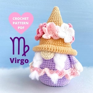 May include: Crochet pattern PDF for a Virgo gnome. The gnome is purple with a white beard and a tan hat with pink and white flowers.