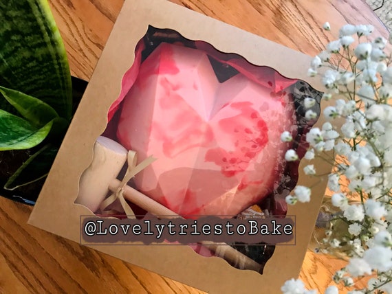 breakable chocolate heart with money