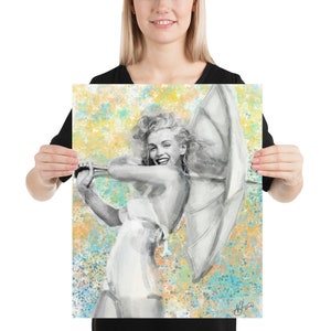 May include: A black and white illustration of a woman holding a white umbrella. The background is a yellow, blue, and green watercolour splatter.