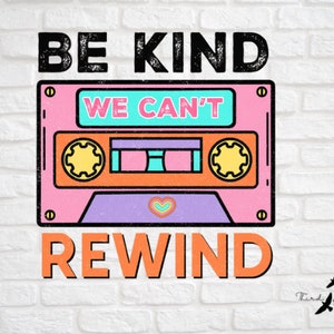 May include: A pink and orange cassette tape with the text "Be Kind We Can't Rewind" in black and orange lettering. The cassette tape has a heart in the center.