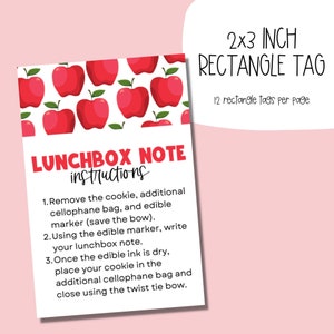 May include: Printable 2x3 inch rectangle tags with a red apple pattern. The tags include instructions for a lunchbox note: "Remove the cookie, additional cellophane bag, and edible marker (save the bow). Using the edible marker, write your lunchbox note. Once the edible ink is dry, place your cookie in the additional cellophane bag and close using the twist tie bow."