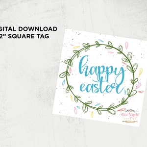 May include: A square tag with the text "happy easter" in blue script, surrounded by a green wreath with colorful accents. The tag is 2 inches square and features the text "DIGITAL DOWNLOAD".