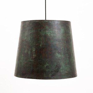 May include: A green and brown metal pendant light with a wide, cone-shaped shade.