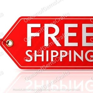 May include: A red tag with white text that reads "FREE SHIPPING". The tag has a string attached to it.
