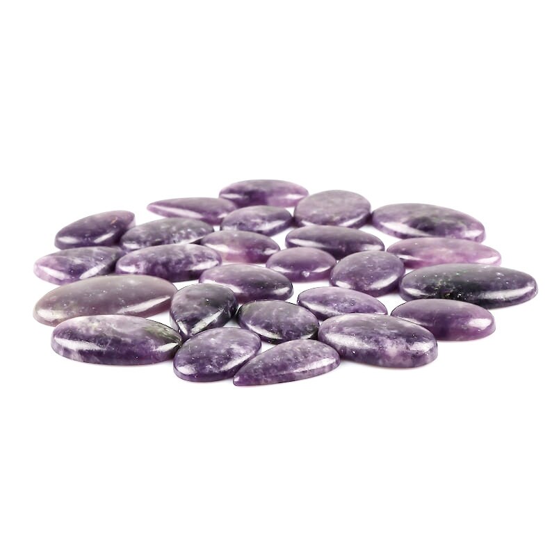 May include: A collection of 20 purple and white lepidolite cabochons, oval and teardrop shaped, arranged in a circle on a white background.