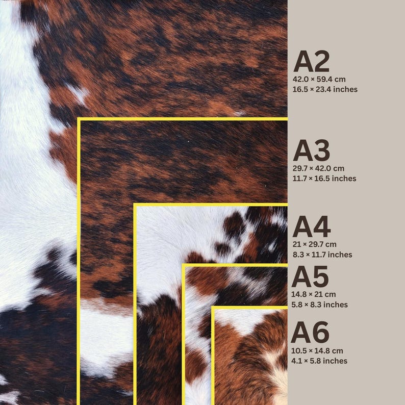 May include: A cowhide pattern with brown, white, and black markings. The image shows different paper sizes: A2 (16.5 x 23.4 inches), A3 (11.7 x 16.5 inches), A4 (8.3 x 11.7 inches), A5 (5.8 x 8.3 inches), and A6 (4.1 x 5.8 inches).