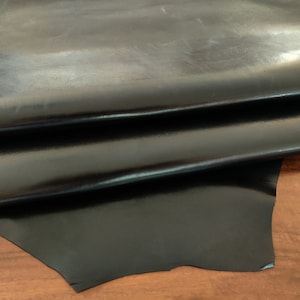 Shiny black thin kangaroo hides, veg tan glossy k leather, full grain leather pieces for crafts