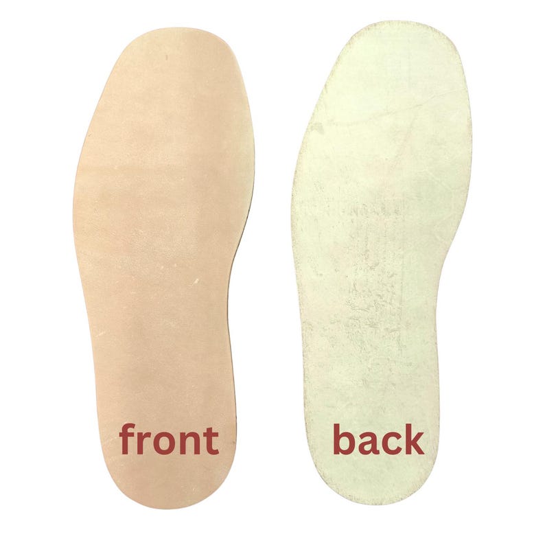 May include: Two insoles, one light tan and one off-white, are displayed against a white background. The light tan insole has the word "front" in red text. The off-white insole has the word "back" in red text. The insoles are shoe inserts.