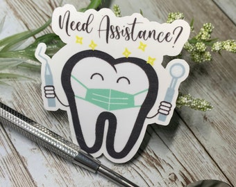 May include: A white cartoon tooth wearing a green face mask and holding a dental tool. The tooth has a happy expression and is surrounded by yellow stars. The text "Need Assistance?" is written above the tooth.