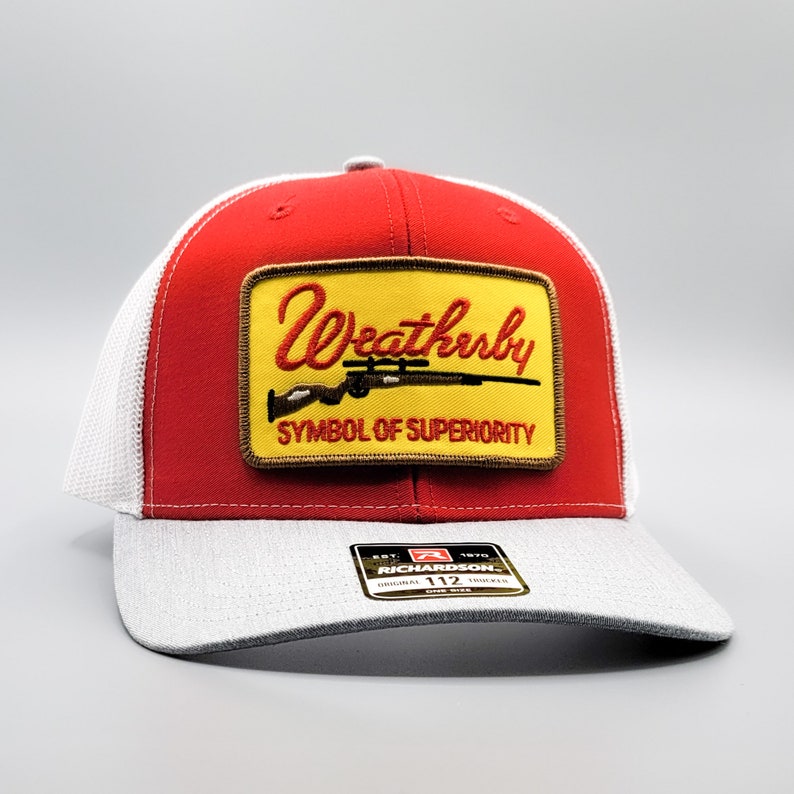 on a Mid-Crown Richardson 112 Mesh Baseball Cap Weatherby Hat Vintage Rifle Gun Patch Weatherby Trucker Hat