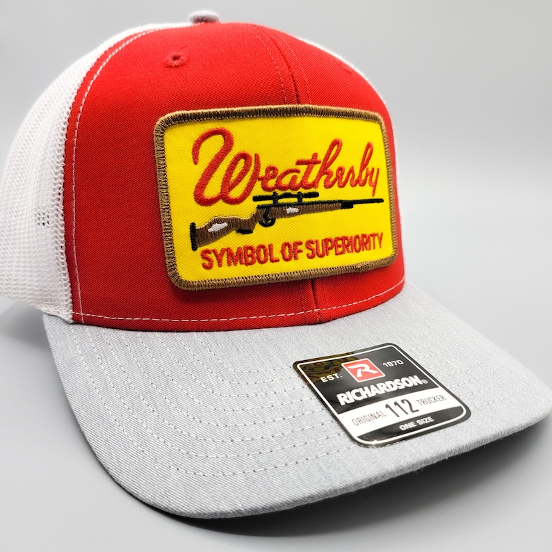 on a Mid-Crown Richardson 112 Mesh Baseball Cap Weatherby Hat Vintage Rifle Gun Patch Weatherby Trucker Hat
