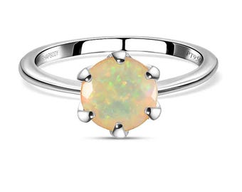Anillo de compromiso vintage para mujer con solitario de ópalo Welo de talla redonda etíope, plata de ley 925 y detalles brillantes.