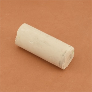May include: A white chalk stick with a slightly rough texture.