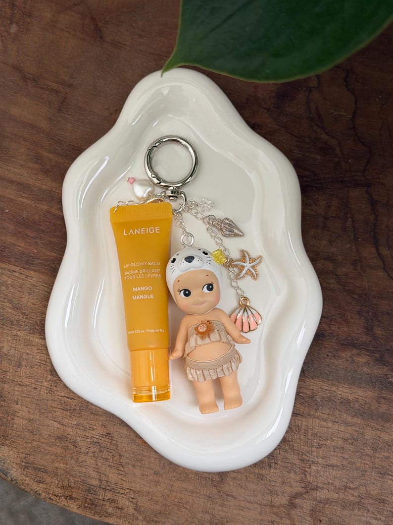 May include: A rustic wooden sign with the text "Welcome to our home" in white lettering. The sign features a distressed finish and a simple, inviting design, perfect for a front porch or entryway.