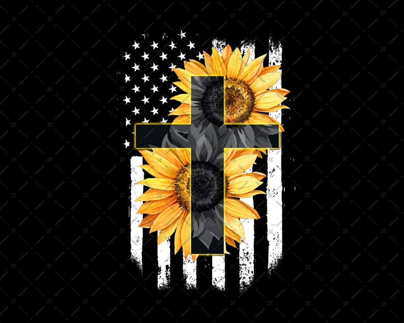 May include: A black cross with a gold outline is centered on an American flag. The cross is surrounded by two sunflowers, one on each side.