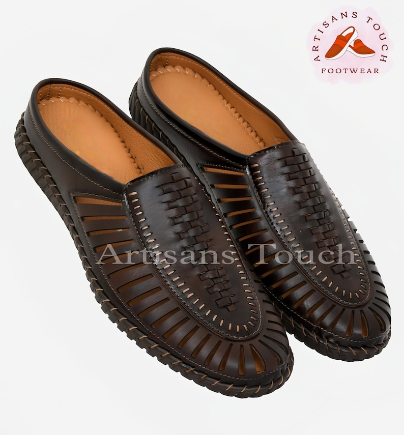 May include: A pair of brown leather sandals with a woven design and open toe. The sandals have a slip-on style and a comfortable, cushioned insole.