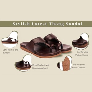 May include: A pair of brown leather thong sandals with a padded insole and a slip-resistant resin outsole. The sandals have a decorative stitching detail around the edges.