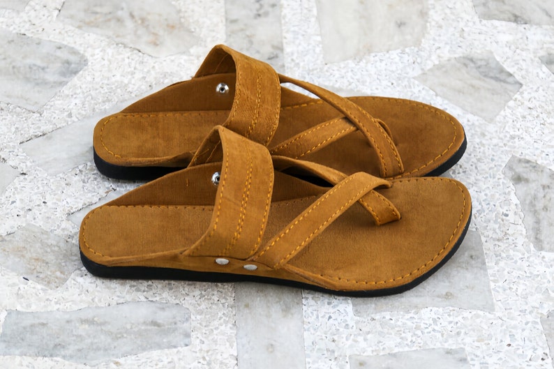 Carpet rooms Slippers,
Tan Colour,
Mustard thread,
Steel button, jaipuri jutti, shoes mule thongs slide sandals slipon men, textile shoe, traditional shoes, beach shoe, holiday shoes, durable shoes, flexible shoes, sustainable men shoes,Orange,