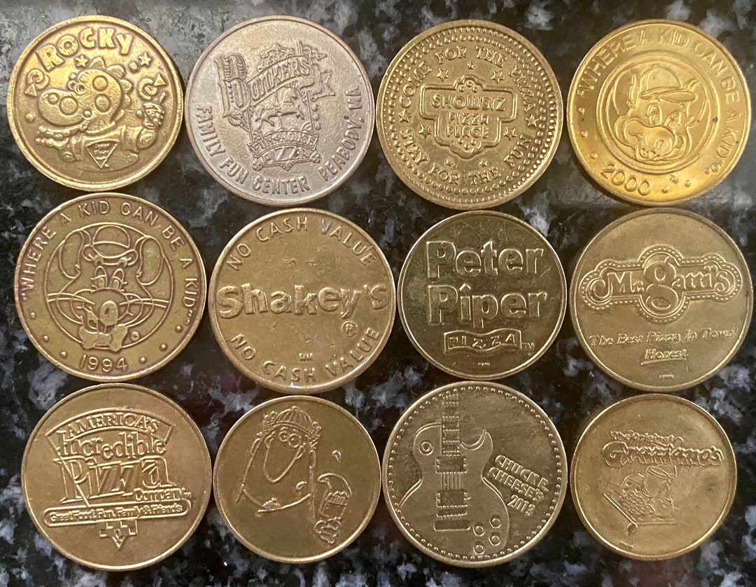 A Collection of 12 Popular Vintage Pizza Arcade Tokens of the 80s