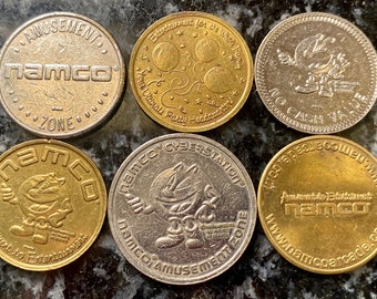 An Collection of 6 Different Vintage Namco Arcade Tokens from 80’s and 90’s