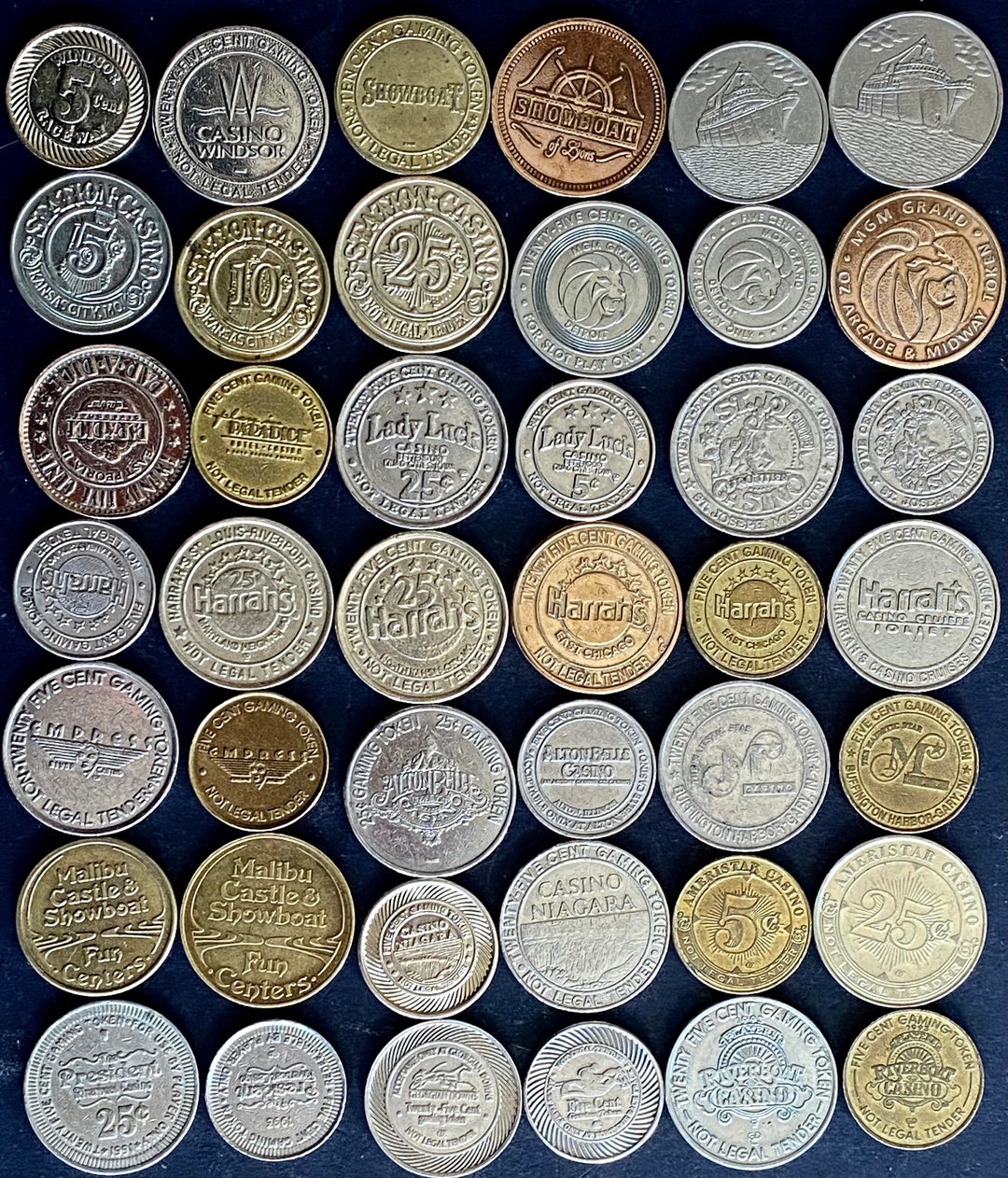 A Collection of 42 Pairs of Vintage 5 & 25 Cent Casino/slot Machine ...