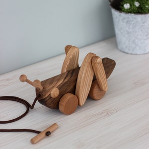 Handmade Wooden baby toys animals on wheels for kids, Educational pull toys for 1 year old, Montessori toys for toddler from Ukraine shops