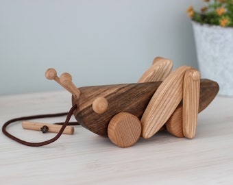 Wooden toy Grasshopper Pull and push toy on wheels Educational Montessori Waldorf toy Gift for toddler Gift for 1 2 year old Boy Girl