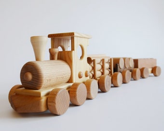 Treno in legno su ruote con carrozze, regalo per la festa del papà. Locomotiva giocattolo per bambini, regalo di compleanno