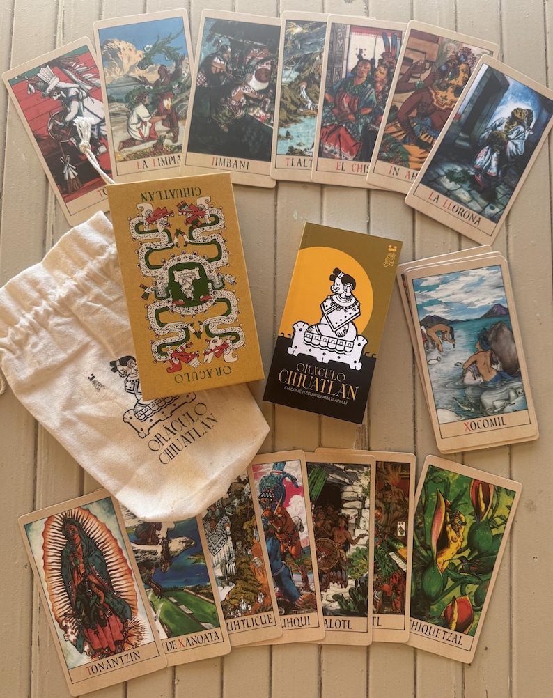 May include: A deck of Oraculo Cihuatlan oracle cards featuring illustrated cards with various figures and scenes, a mustard yellow box with a green serpent design, a black box with a yellow sun and figure, and a cream-coloured drawstring pouch.