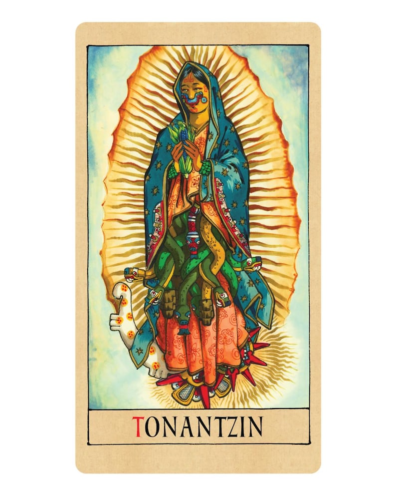 May include: A rectangular card featuring a colourful illustration of a figure draped in a blue cloak with star patterns, holding corn, surrounded by green snakes and a golden sunburst. The word TONANTZIN is printed in black at the bottom of the card.