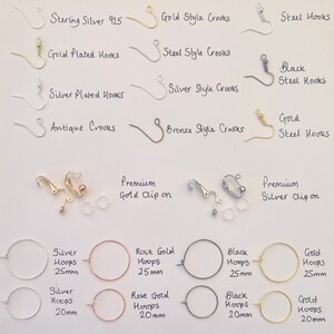 May include: Assortment of earring findings and hoops in various styles and finishes, including sterling silver, gold plated, antique, bronze, and black steel.  Hoops are available in 20mm and 25mm sizes.  Premium gold and silver clip-on earring findings are also included.