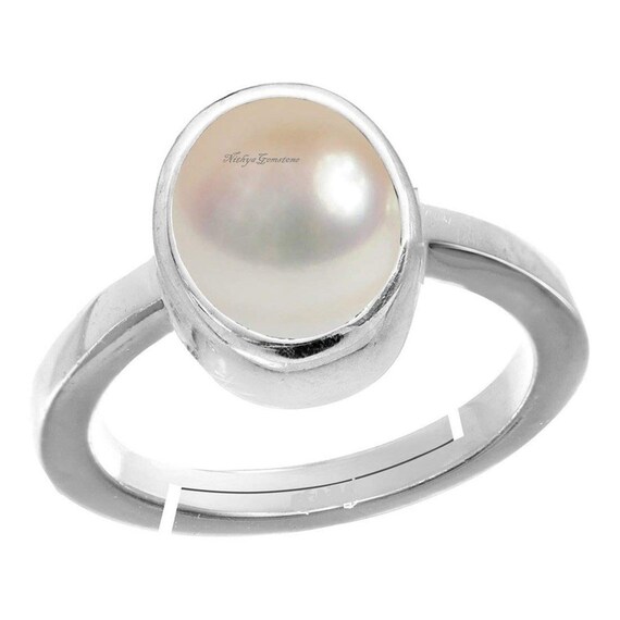 ONDE Flat and tubular bypass ring with tension set white pearl in stainless  steel by Taormina Jewelry