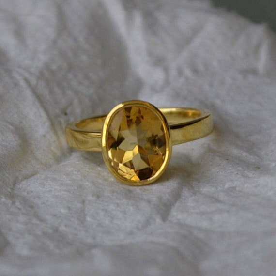 DINJEWEL 8.00 Cts. Pukhraj Stone Original Certified Yellow Sapphire Stone Gold  Ring & Men Metal Gold Plated Ring Price in India - Buy DINJEWEL 8.00 Cts.  Pukhraj Stone Original Certified Yellow Sapphire