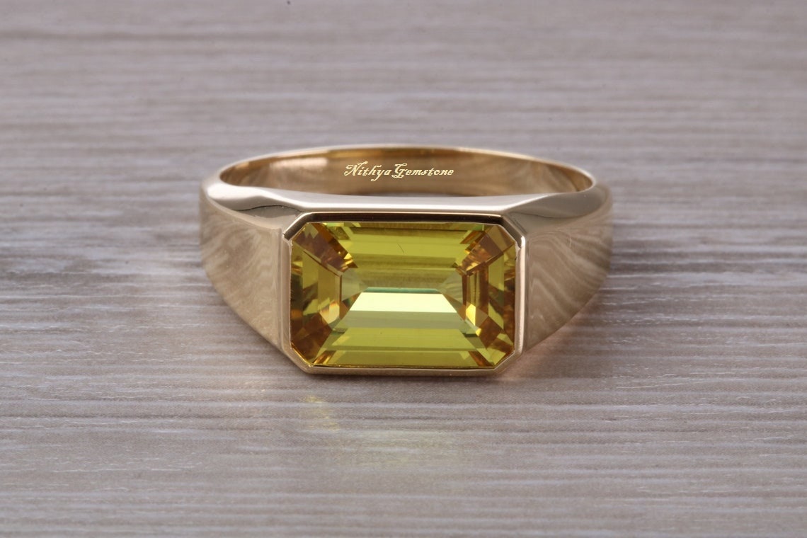 Gents pukhraj ring design deals