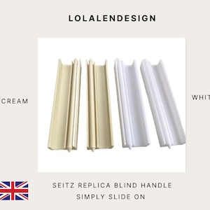 May include: Cream and white Seitz replica blind handles. The image shows four handles, two in cream and two in white. The text on the image says "Simply slide on".