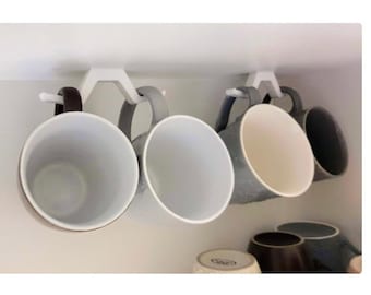 Cup holder, storage space saver, caravan, motorhome