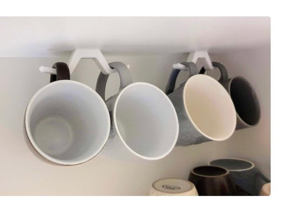 Cup holder, storage space saver, caravan, motorhome