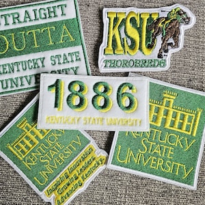 May include: Five embroidered patches featuring the Kentucky State University logo, including the school's mascot, the Thoroughbred, and the year 1886.