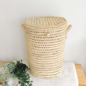 Round wicker laundry basket