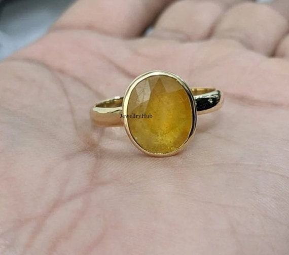 StoneZone Jaipur 4.25 Ratti Natural Certified Yellow Sapphire Shell Pukhraj  Ring for Men and Women : Amazon.in: Jewellery