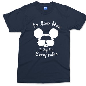 May include: A navy blue t-shirt with a white graphic of Mickey Mouse wearing sunglasses and the text "I'm Just Here To Pay For Everything".