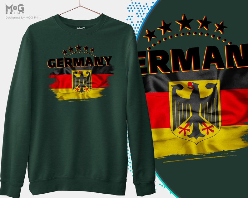 May include: A dark green sweatshirt with a distressed German flag design and the word "GERMANY" in black letters. The flag features the German eagle and the colors black, red, and yellow.