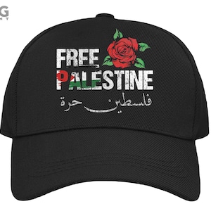 May include: Black baseball cap with the text "FREE PALESTINE" in white with a red rose and a Palestinian flag graphic. The text "فلسطين حرة" is also printed on the cap.