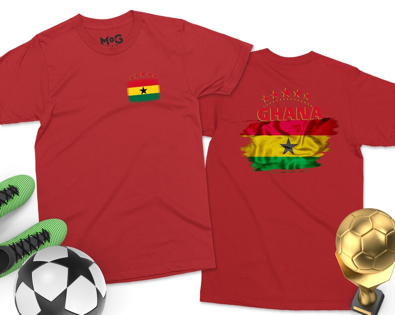 May include: Two red t-shirts with a Ghanaian flag design. One shirt has a small flag on the front and the other has a larger flag with the word "GHANA" on the back.